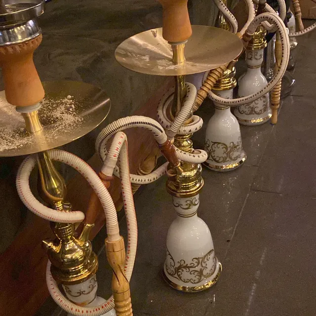 A row of gold Cedar shishas ready for service